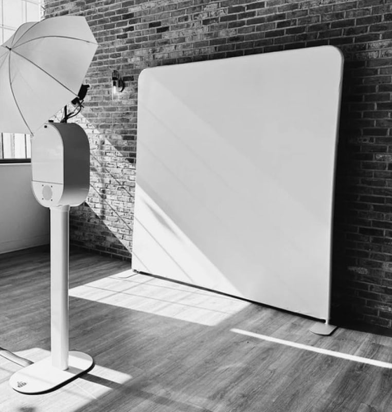 Photography studio setup with lighting and backdrop for professional shoots.